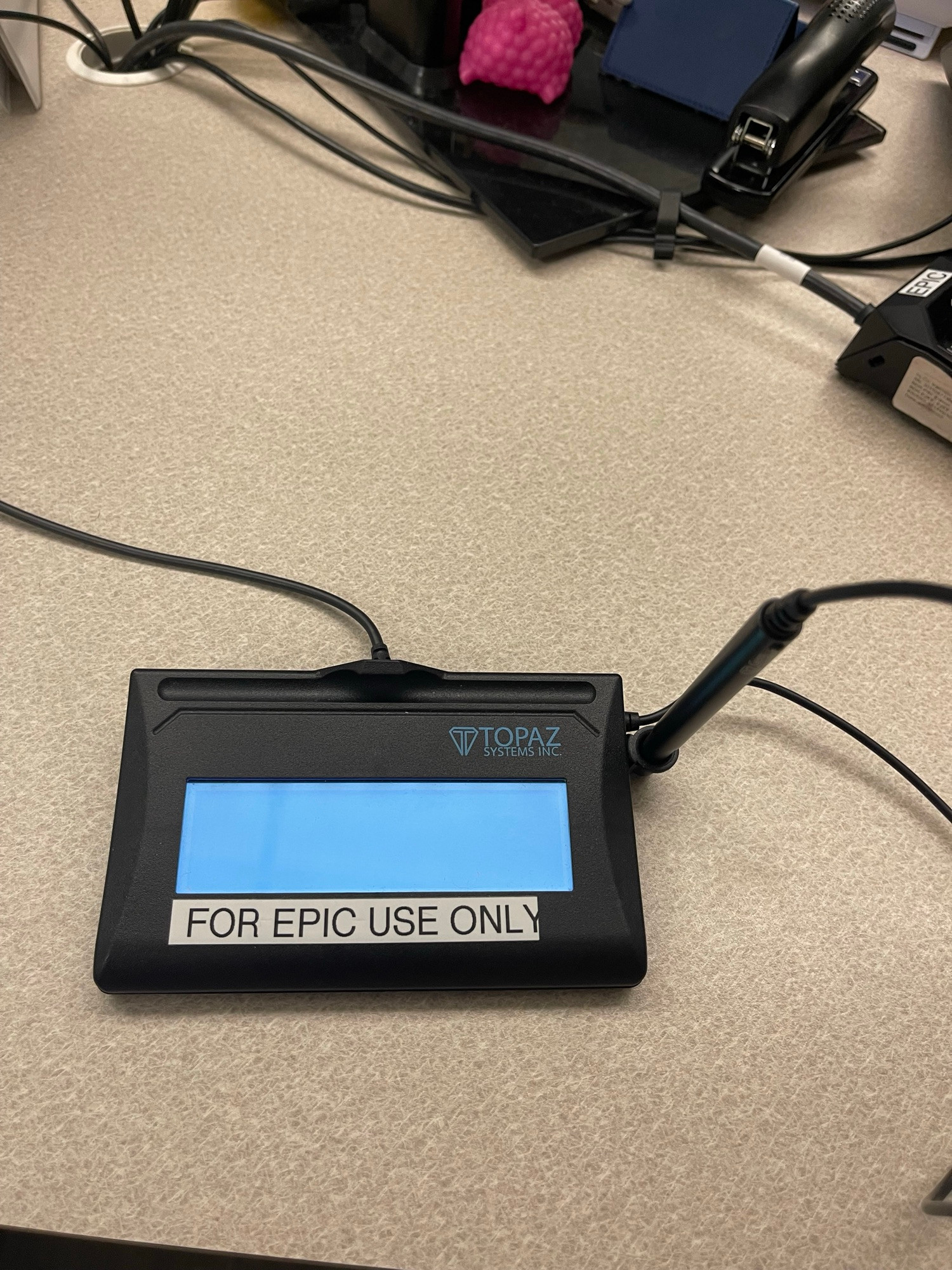 a digital signature pad labeled “FOR EPIC USE ONLY”